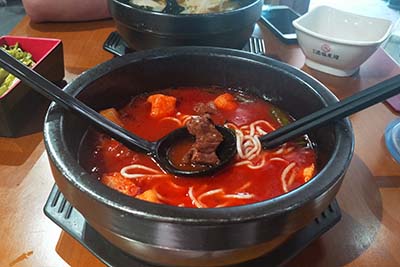 十秒到過橋米線總部能夠給予加盟商哪些扶持